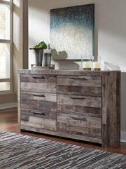 Derekson dresser by Ashley Furniture featuring a modern wooden design with multiple drawers and sleek hardware.