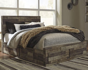 Ashley Furniture Derekson bed with four storage drawers, featuring a sturdy frame and classic design in a cozy bedroom setting.