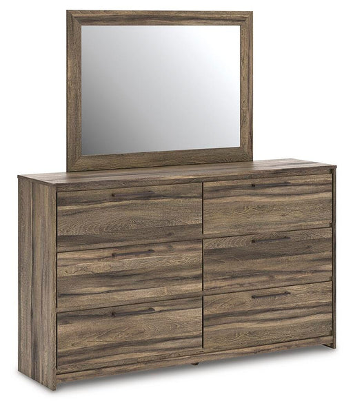Ashley Furniture Elbrim dresser with matching mirror, featuring a modern wood finish and sleek hardware, shown from an angled side view.