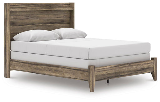Ashley Furniture Elbrim bed with a stylish wood frame and angled headboard, shown in a bedroom setting.