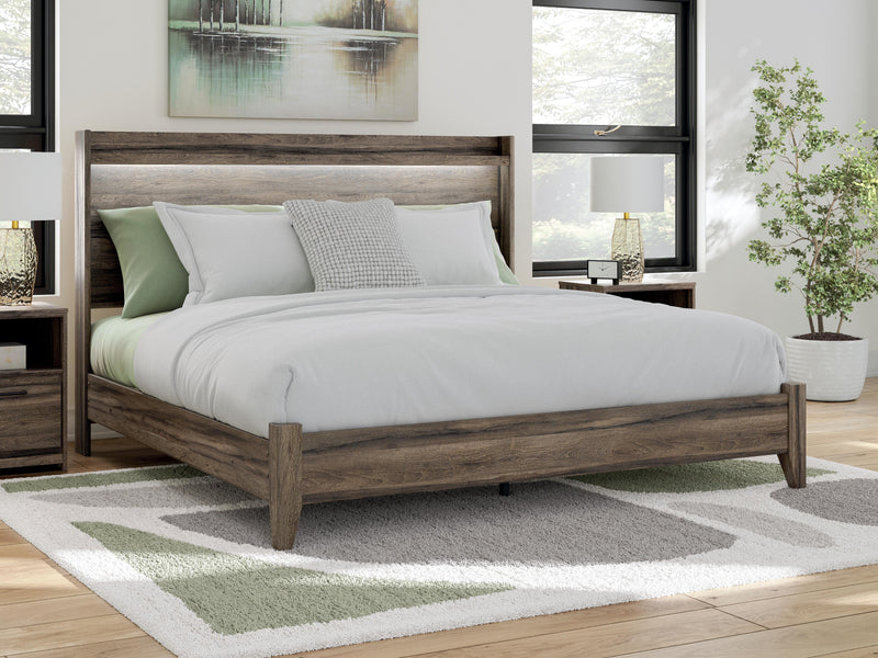 Ashley Furniture Elbrim Bed with wooden headboard and frame, showcasing a classic design perfect for a cozy bedroom setting.
