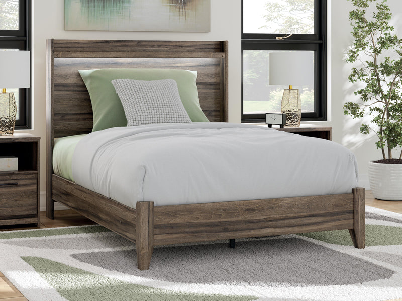 Ashley Furniture Elbrim Bed with a wooden frame, featuring a classic design and a warm finish, shown in a bedroom setting.