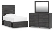 Ashley Furniture Hollivern bedroom set featuring a bed frame, dresser, and nightstands with elegant wood finish and modern design.