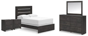 Ashley Furniture Hollivern bedroom set includes a bed, nightstands, and dresser with stylish, modern design in a cozy bedroom setting.