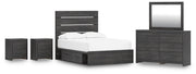 Ashley Furniture Hollivern bedroom set with bed, nightstands, and dresser in a modern design, shown in a well-lit bedroom setting.