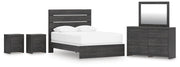 Ashley Furniture Hollivern bedroom set displaying a stylish bed frame with matching nightstands and dresser in a modern bedroom scene.