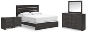 Ashley Furniture Hollivern Bedroom Set featuring a modern bed frame, matching nightstands, and a stylish dresser in a cozy bedroom.