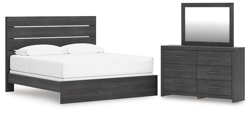 Ashley Furniture Hollivern Bedroom Set with bed frame, nightstands, and dresser in a modern bedroom setting.