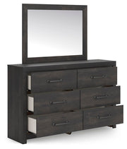 Ashley Furniture Hollivern Bedroom Set featuring a queen bed, matching nightstands, and a dresser with modern design.