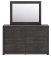 Ashley Furniture Hollivern bedroom set featuring a modern bed frame with a stylish headboard and matching bedroom furniture.