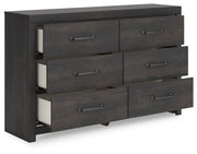 Ashley Furniture Hollivern dresser and mirror set with open drawers, showcasing a stylish wooden finish and elegant design.