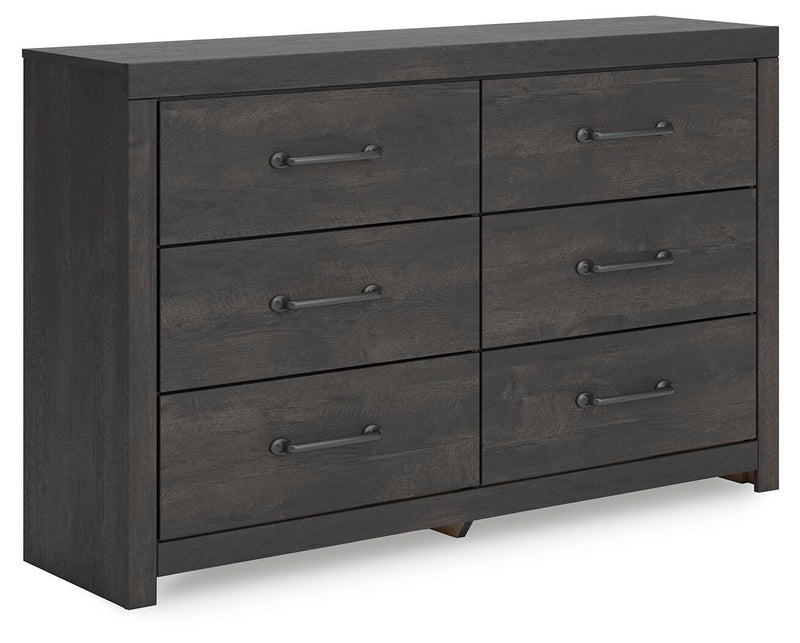 Ashley Furniture Hollivern dresser with multiple drawers, angled view showcasing its dark wood finish and contemporary design.