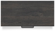 Ashley Furniture Hollivern chest of drawers with sleek wood finish and modern top surface, shown in a stylish bedroom setting.