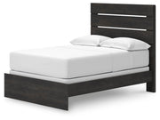 Ashley Furniture Hollivern bedroom set featuring a wood bed frame, matching nightstands, and a cozy, stylish bedroom furniture arrangement.