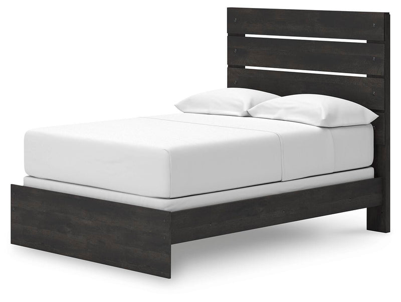 Ashley Furniture Hollivern bedroom set featuring a wood bed frame, matching nightstands, and a cozy, stylish bedroom furniture arrangement.