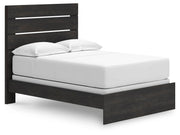 Ashley Furniture Hollivern bedroom set featuring a bed with a stylish headboard, matching nightstands, and coordinated bedding in neutral tones.