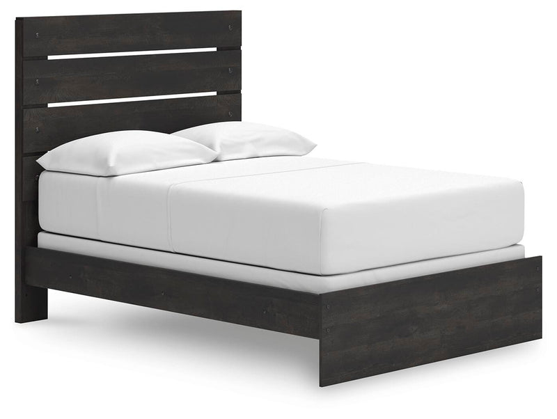 Ashley Furniture Hollivern bedroom set featuring a bed with a stylish headboard, matching nightstands, and coordinated bedding in neutral tones.