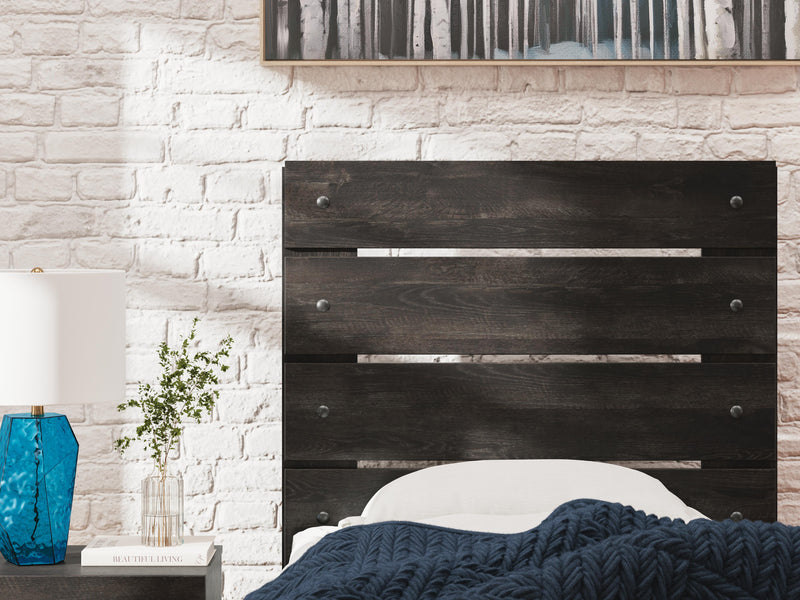 Ashley Furniture Hollivern bedroom set with a bed, nightstands, and dresser in a modern, stylish design.