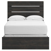 Ashley Furniture Hollivern bedroom set featuring a stylish bed with a headboard, nightstands, and matching bedroom furniture.