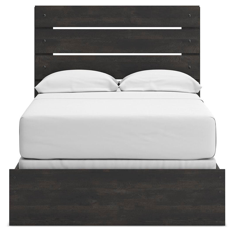 Ashley Furniture Hollivern bedroom set featuring a stylish bed with a headboard, matching nightstands, and coordinated bedroom decor.