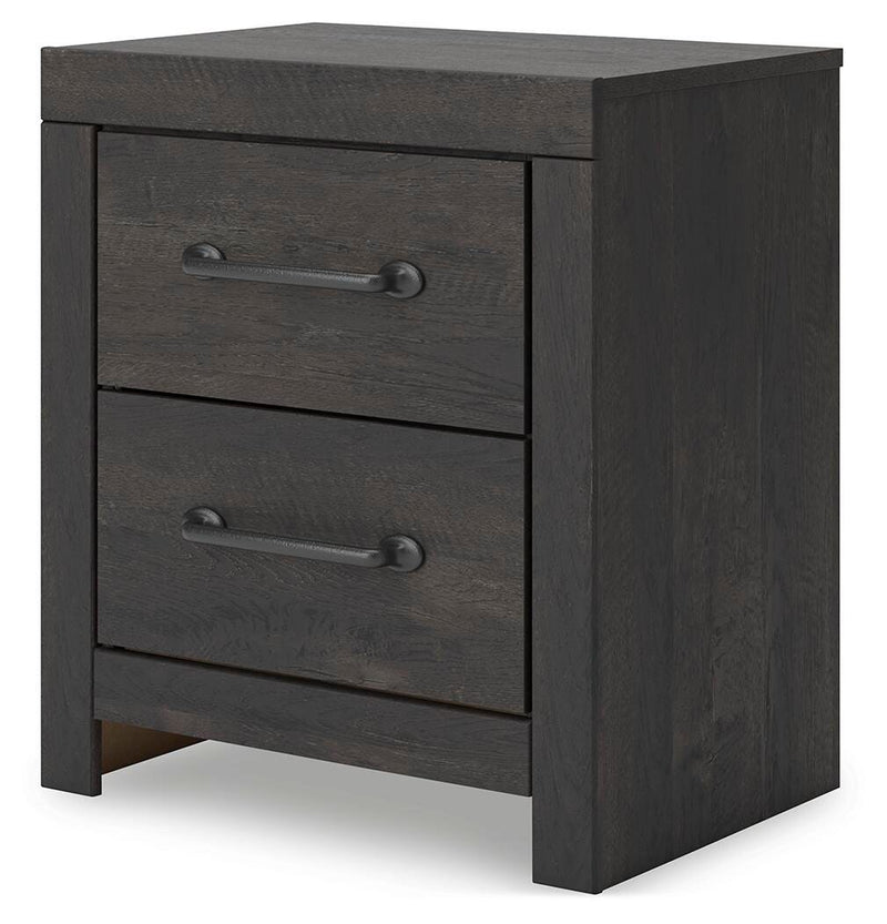 Ashley Furniture Hollivern bedroom set with a modern bed frame, matching nightstands, and coordinated decor in a stylish bedroom.