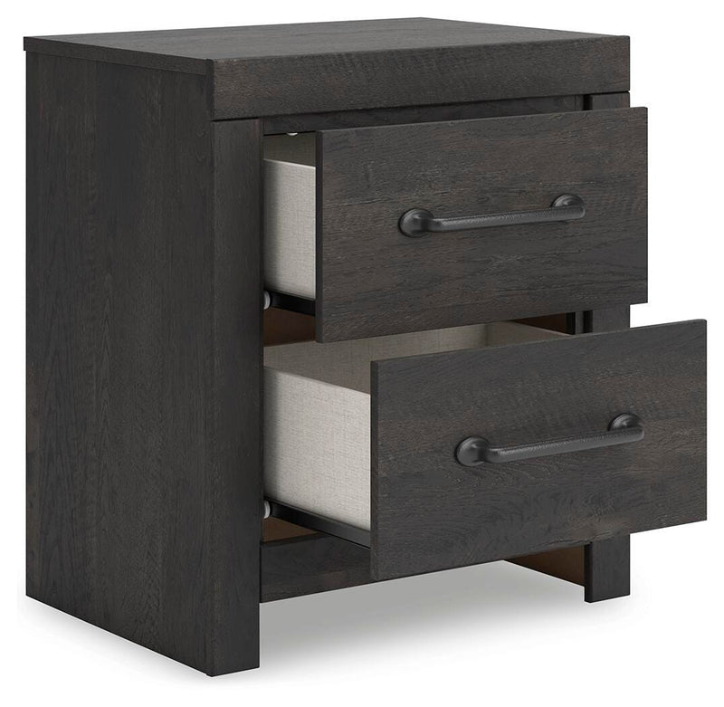 Ashley Furniture Hollivern bedroom set with a bed, nightstands, and dresser shown from an angled open view.