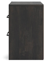 Ashley Furniture Hollivern bedroom set featuring a stylish bed frame, matching nightstands, and coordinating bedroom furniture.
