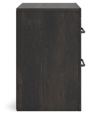Ashley Furniture Hollivern bedroom set with matching bed frame, nightstand, and dresser in a cozy, modern bedroom decor.