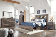 Ashley Furniture Drystan Youth Bed with two storage drawers, featuring a sturdy wood frame and a classic design for kids' bedrooms.
