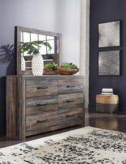 Ashley Furniture Drystan Dresser with six drawers, wooden finish, and modern design for bedroom storage.
