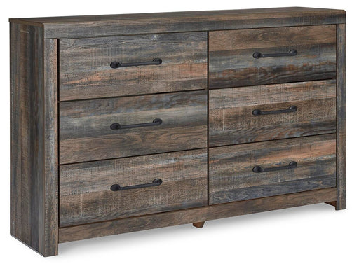 Ashley Furniture Drystan Dresser with six spacious drawers and a modern wood finish, shown from an angled view.