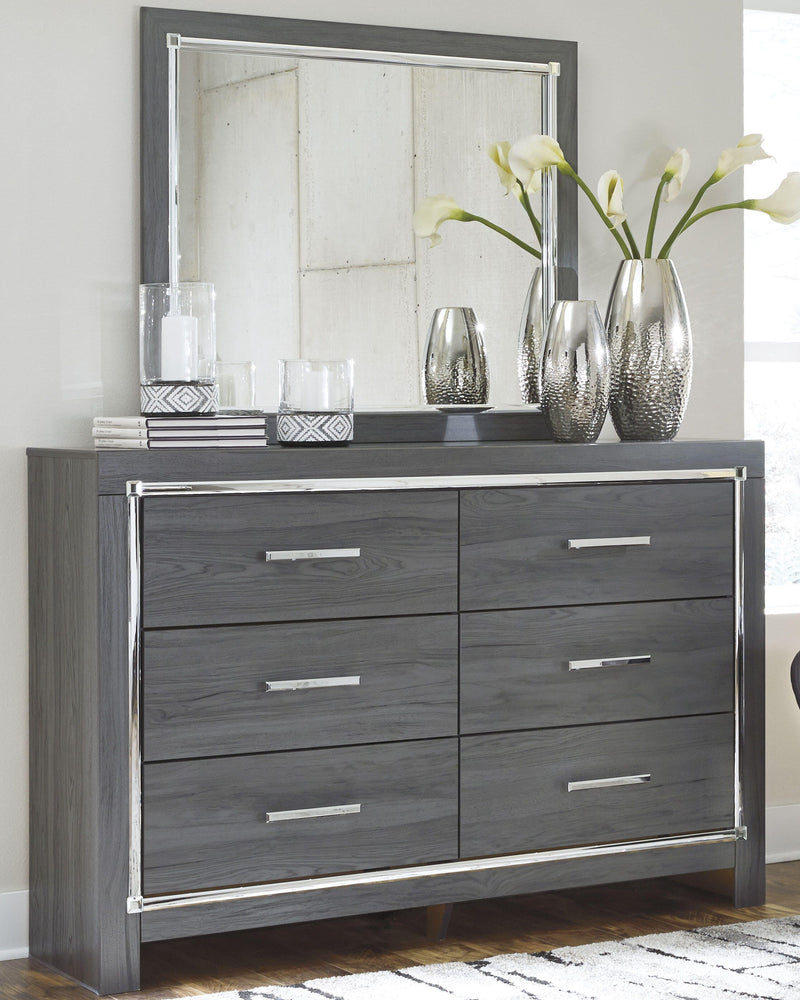Ashley Furniture Lodanna bedroom set with a wooden bed frame, nightstands, and dresser in a stylish bedroom interior.