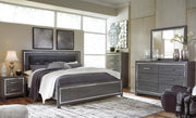 Ashley Furniture Lodanna bedroom set with a bed, matching nightstands, and dresser in a classic, elegant bedroom scene.