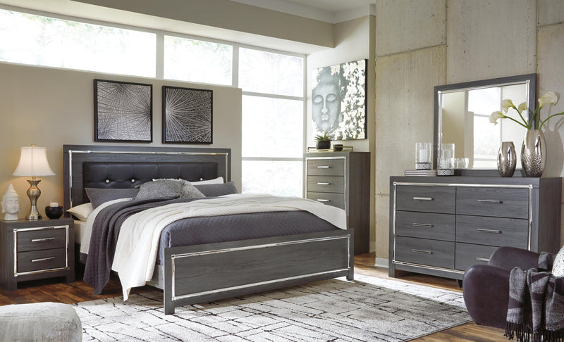 Ashley Furniture Lodanna bedroom set with a bed, matching nightstands, and dresser in a classic, elegant bedroom scene.