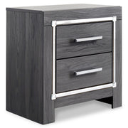Ashley Furniture Lodanna bedroom set with a stylish bed frame and matching furniture, shown from an angled view.