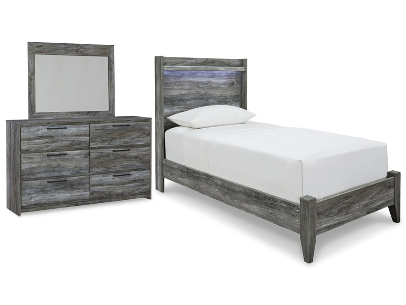 Ashley Furniture Baystorm youth bedroom set featuring a modern bed, matching dresser, and nightstand in a stylish bedroom scene.