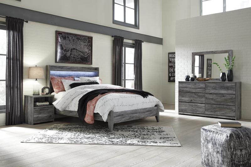 Ashley Furniture Baystorm youth bedroom set featuring a bed, dresser, and nightstand in a modern, stylish bedroom scene.