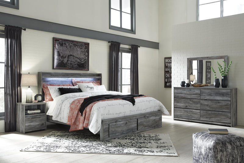 Ashley Furniture Baystorm youth bedroom set featuring a bed, dresser, and nightstand in a modern design, shown in a well-lit bedroom.