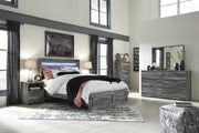 Ashley Furniture Baystorm nightstand with wood finish, featuring a sleek tabletop and storage drawer, modern bedroom decor.