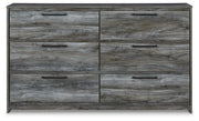 Ashley Furniture Baystorm dresser with sleek drawer handles, dark wood finish, and modern design visible in the front view.