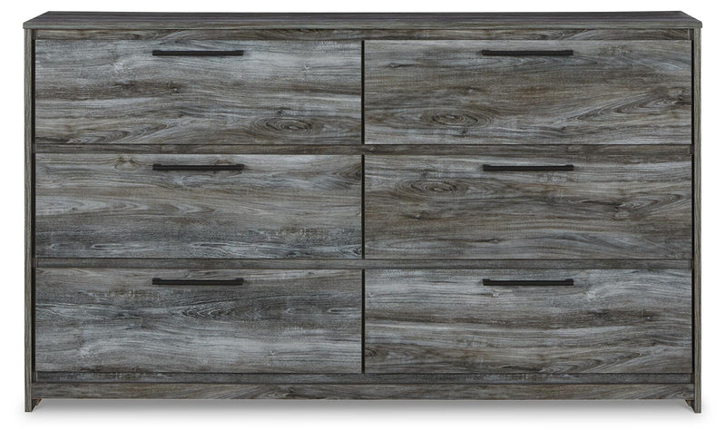 Ashley Furniture Baystorm dresser with sleek drawer handles, dark wood finish, and modern design visible in the front view.