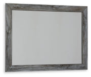 Ashley Furniture Baystorm dresser and mirror set, showing a modern wood dresser with a matching mirror in a well-lit room.