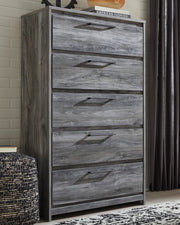 Ashley Furniture Baystorm chest of drawers, wooden bedroom storage unit with multiple drawers, in a natural wood finish.