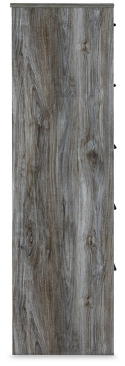 Ashley Furniture Baystorm chest of drawers, side view showing dark wood finish and modern design with multiple drawers.