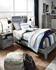Ashley Furniture Baystorm Youth Bed with a sturdy wooden frame and stylish design, ideal for a child's bedroom.