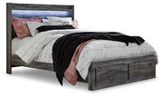 Ashley Furniture Baystorm storage bed with a dark wood finish, featuring built-in drawers and a modern design.