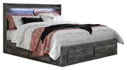 Ashley Furniture Baystorm storage bed with built-in drawers and dark wood finish, showcasing a stylish bedroom furniture piece.