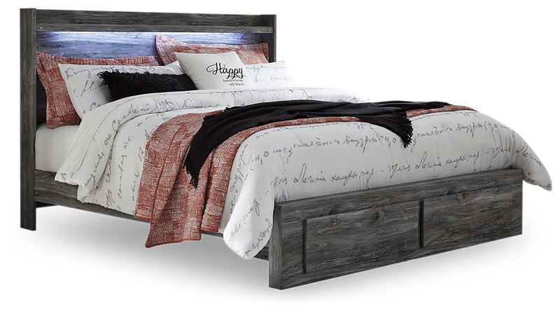 Ashley Furniture Baystorm Storage Bed with built-in drawers, featuring a modern design and neutral finish, shown in a well-lit bedroom setting.