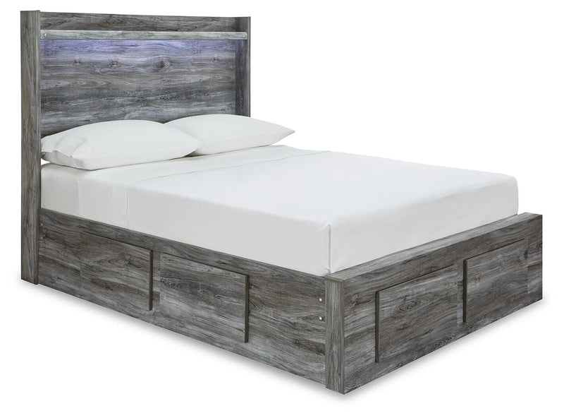 Ashley Furniture Baystorm Storage Bed with built-in drawers and a modern design, shown from an angled side view.