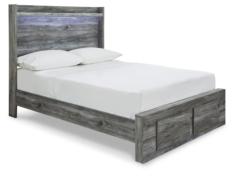Ashley Furniture Baystorm Storage Bed with angled view, showcasing sleek wood finish and built-in storage drawers.